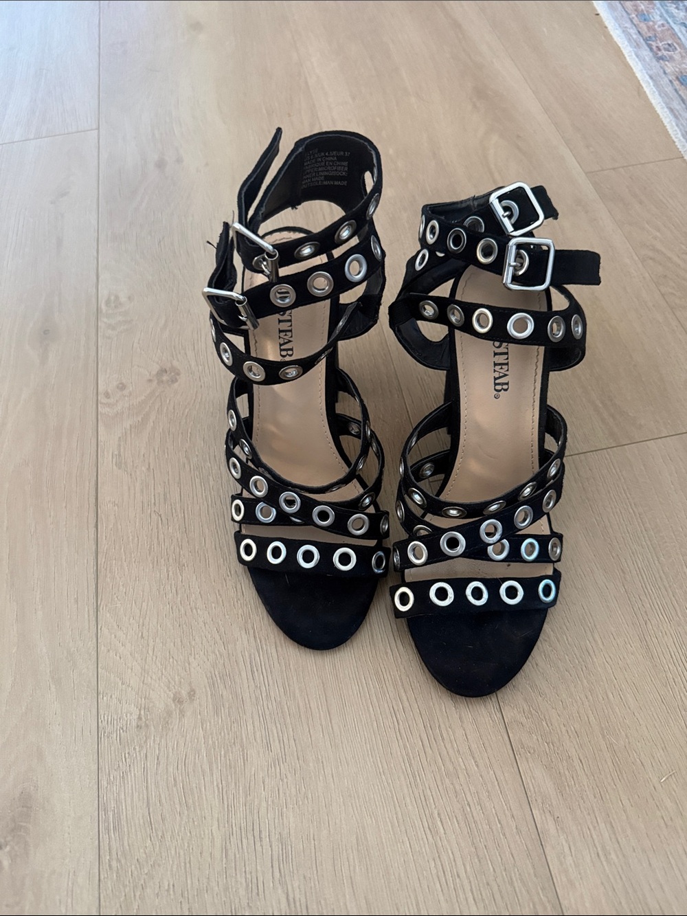 Black Grommet Strappy Heels by Steve Madden